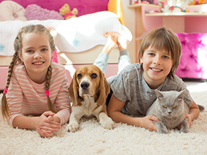 Children with a dog at home